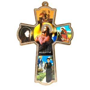 a wooden cross depicting scenes of Jesus
