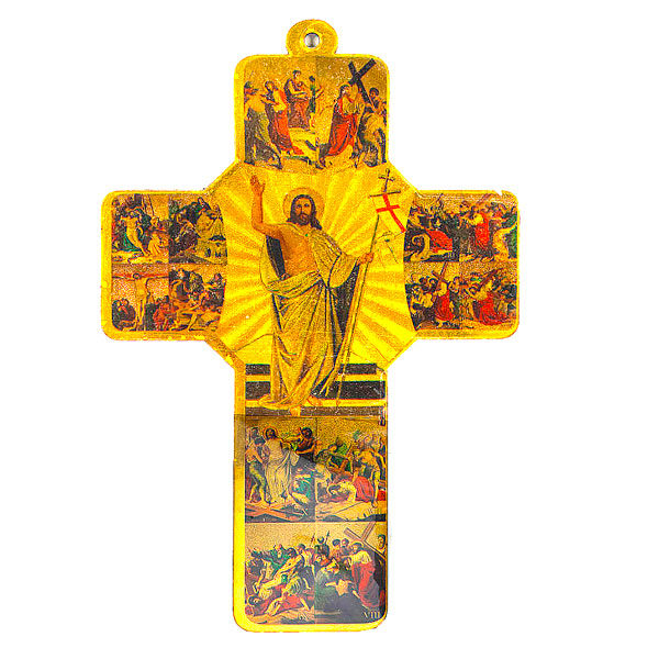 a wooden cros with scenes depicting Jesus