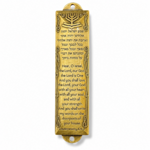 Brass-plated Shema Mezuzah featuring the complete Shema prayer in Hebrew and English, decorative Menorah design, and included mezuzah parchment scroll, measuring 5 inches for traditional Jewish doorway blessings.