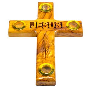 a wooden cross with the name Jesus
