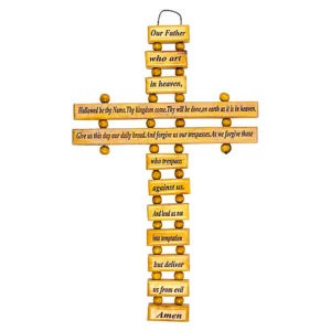 a wooden cross with the Lord's prayer
