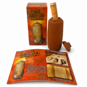 Dead Sea Scrolls Replica Kit featuring a 5-inch handcrafted clay jar, replica ancient scroll, and educational booklet in English and Spanish, inspired by the Qumran discoveries near the Dead Sea.