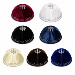 Traditional Jerusalem Cross Kippah featuring an embroidered Jerusalem Cross, available in velvet or satin and six colors including beige, black, blue, maroon, white, and brown for worship, prayer, church services, and Holy Land pilgrims.