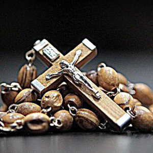 a rosary wooden cross with Jesus